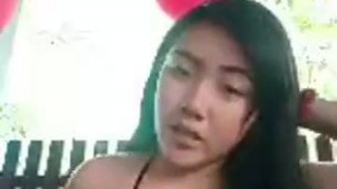 sexy asian doing selfies in bikini